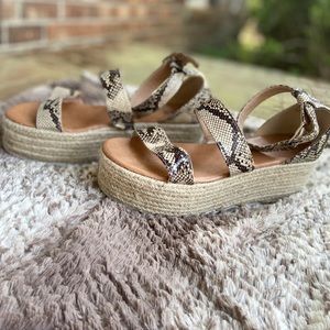 AMS snakeskin platforms